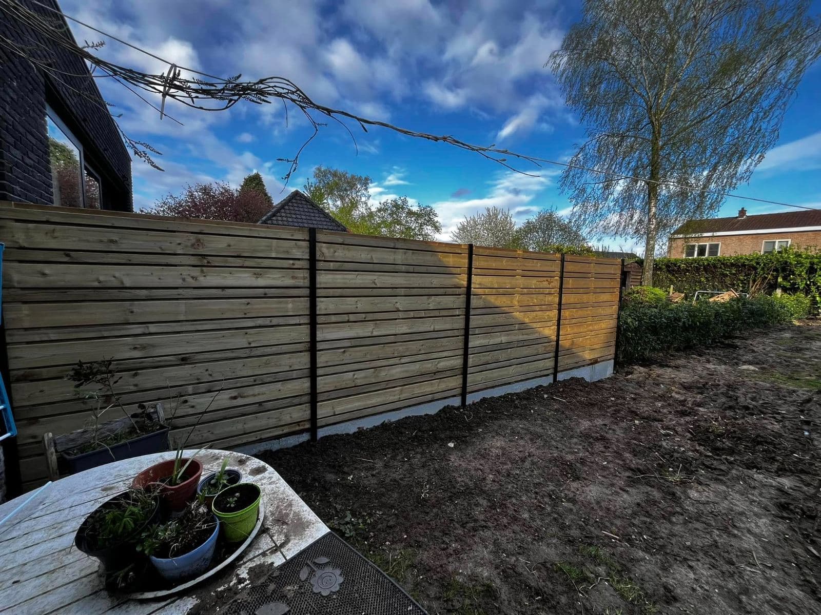 Tuinafsluiting, realisatie van Tuinen Haemers in de regio Kortrijk